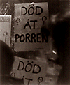 Foto på affischer med texten "Död åt porren"