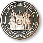 Symbol för MIT, i mitten mellan två gubbar står "Science and Arts" och mellan dem "1861" och längst ner "Mens et Manus".