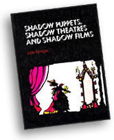 Foto av omslaget till Lotte Reinigers bok med titeln "Shadow Puppets, Shadow Theatres and Shadow Films" Omslaget är i svart med vit skuggad text. Under titeln är en siluett i flera färger av en kvinna och ett draperi.
