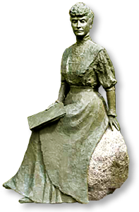 Ursparat foto av en staty av en kvinna som sitter på en sten och håller i en bok
