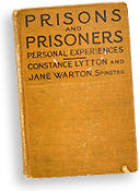 Omslag av en bok i form av gul väv med texten: Prison and Prisobners - personal experiences - Constance Lytton and Jane Warton