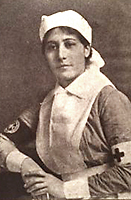 Foto av pprinsessan Sopfia i sjuksköterskkeuniform, sittande  i halvfigur