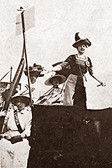 Foto av en kvinna som står högt ovanför de andra utomhus