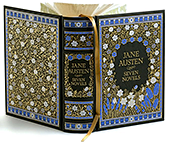 En samlingsvolym (bok) med Jane Austens sju romaner.  Boken har ett vackert gammalt blommönster i vitt, svart, blått och guld.