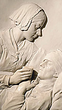 Florence Nightingale vårdar en sjuk man på en relief i S:t Pauls sjukhus
