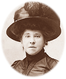 Porträttfoto av Hubertine Auclert iförd en stor hatt